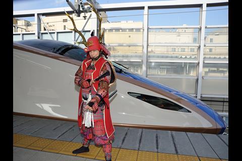 A daimyo feudal lord welcomed a preview train at Nagano on February 5 (Photo: Akihiro Nakamura).